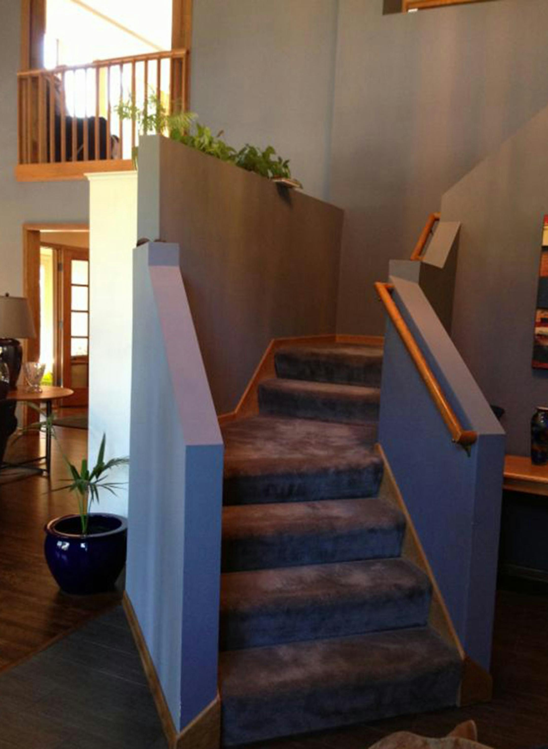 Here's what it looked like before the foyer staircase transformation by Lake Country Builders.