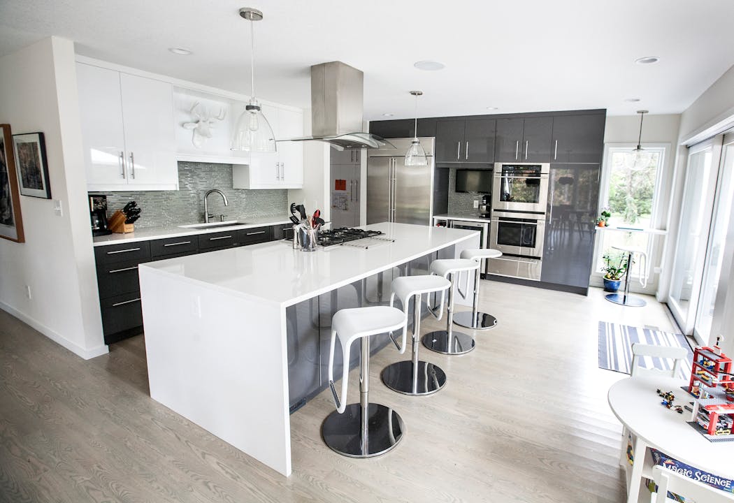 White and gray are still the most popular colors for kitchen cabinets, backsplashes and walls.