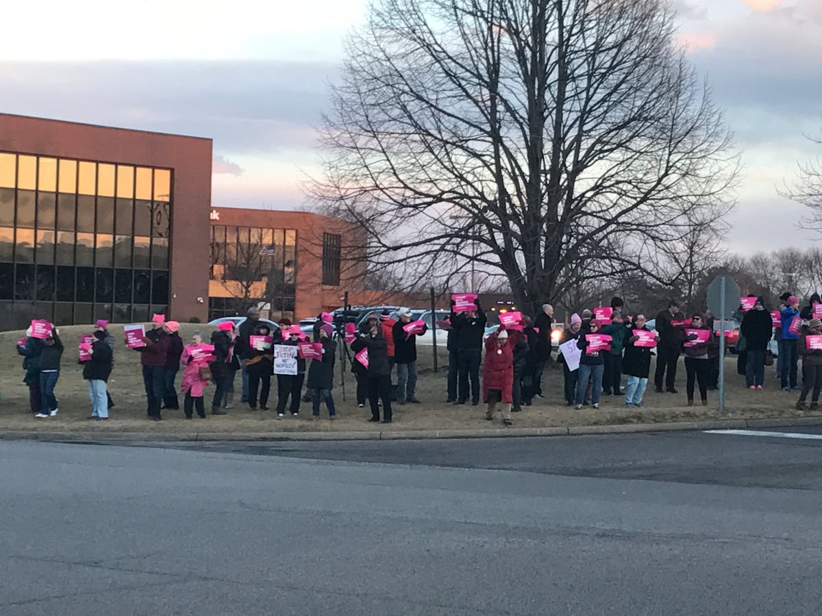 Frustrated by the lack of engagement from U.S. Rep. Erik Paulsen and by his support of defunding Planned Parenthood, dozens of protesters demonstrated