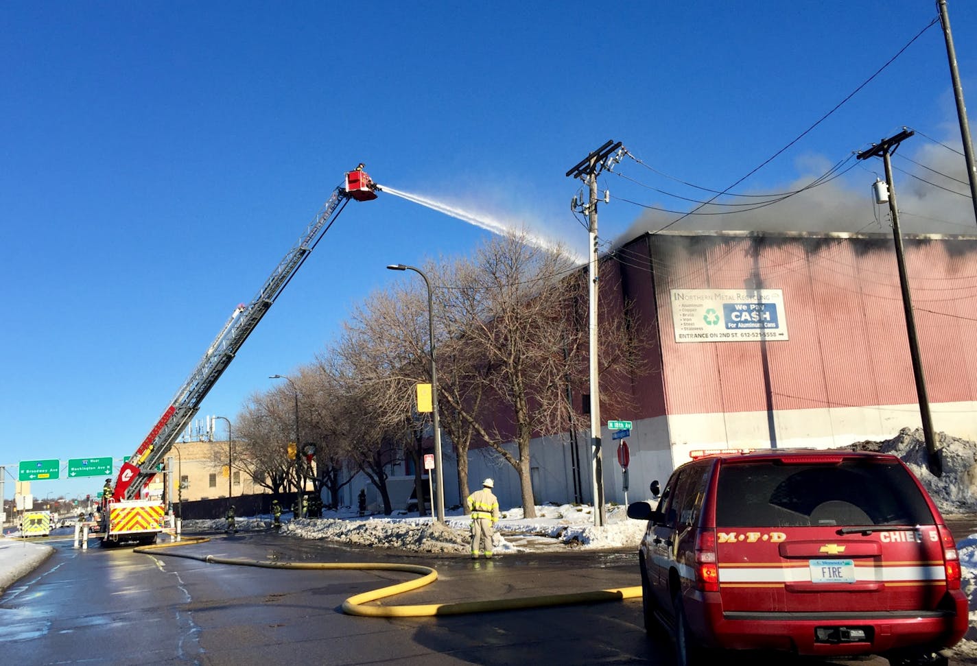 Smoke billowed from a fire at Minneapolis Metal Recycling on 2nd St. North in Minneapolis Tuesday morning.