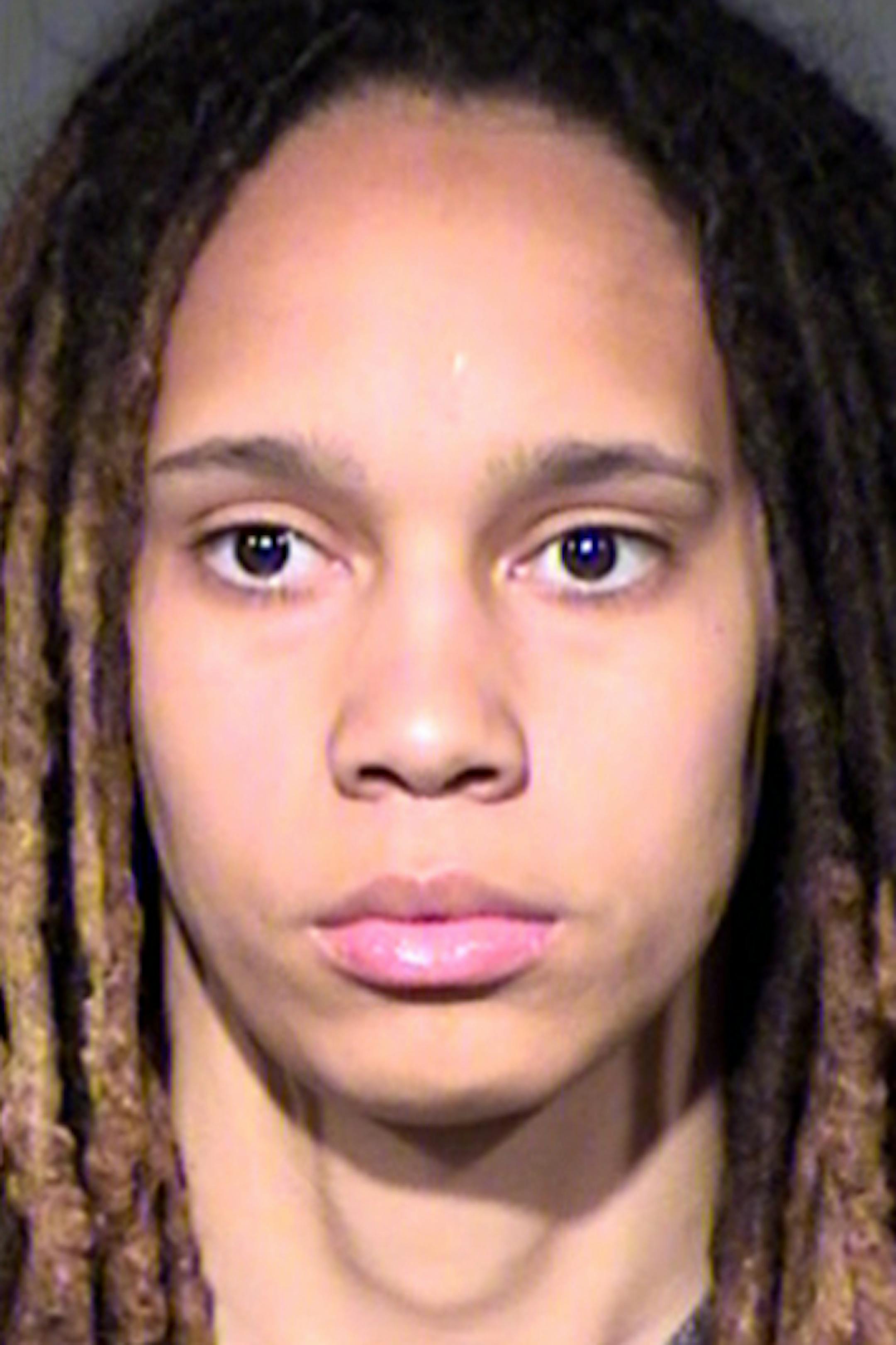 This combo of booking photos released by the Maricopa County Sheriff's Office, show WNBA players Brittney Griner, left, and her fiancee Glory Johnson. The couple were arrested Wednesday, April 22, 2015, on suspicion of assault and disorderly conduct following a fight at their home in a Phoenix suburb. The two 24-year-olds were booked into jail in Phoenix following their arrests and later released. The pair announced their engagement late last summer. (Maricopa County Sheriff's Office via AP)