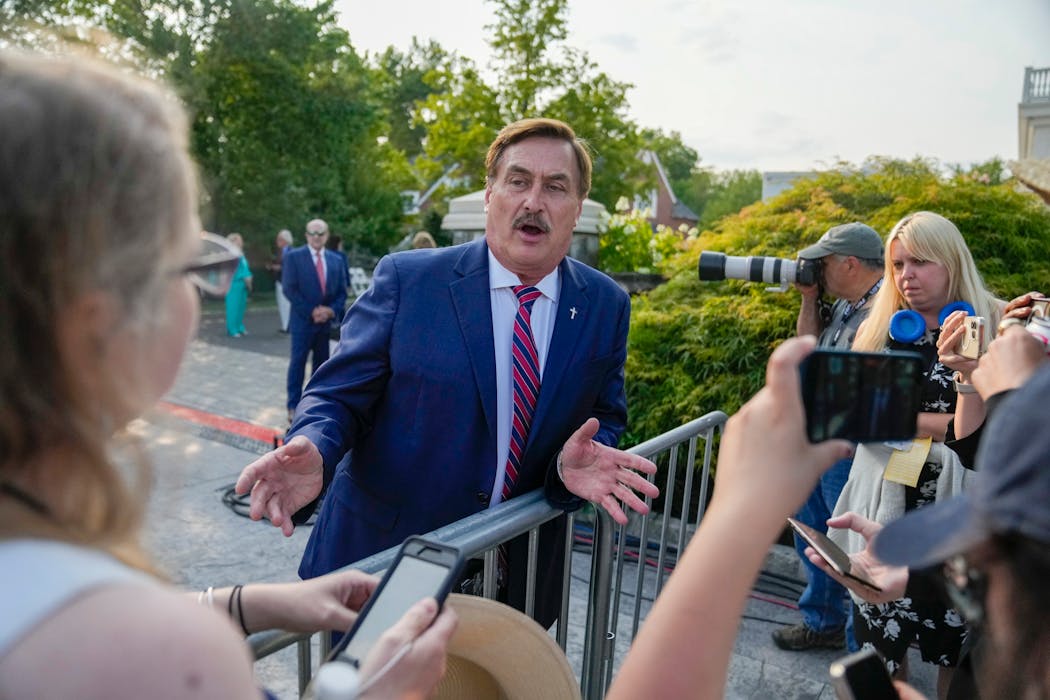 Mike Lindell spoke to reporters while waiting for former President Donald Trump to speak at Trump National Golf Club in Bedminster, N.J., in June.