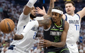 Jaden McDaniels makes a pass in the first quarter of Game 5.