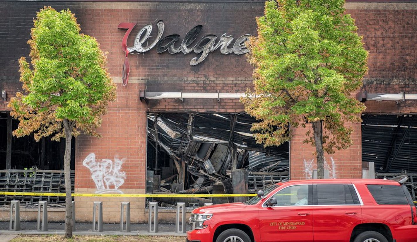 Minneapolis Fire Chief John Fruetel parked in front of the burned-out Walgreens on East Lake St. He said he was doing damage assessments around Minneapolis.