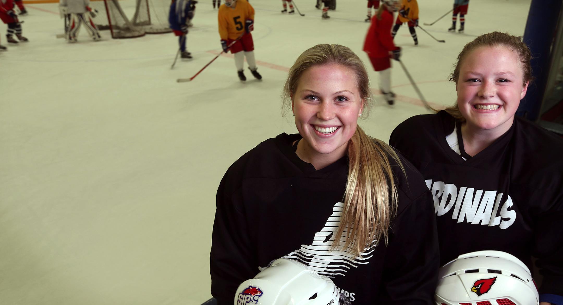 Taylor Turnquist left and Alyssa Hansen posed for a portrait during practice at Fogerty Arena Monday November 17, 2015 in Blaine, MN. ] Coon Rapids girls' hockey formed a co-op this year with Spring Lake Park. Jerry Holt/ Jerry.Holt@Startribune.com