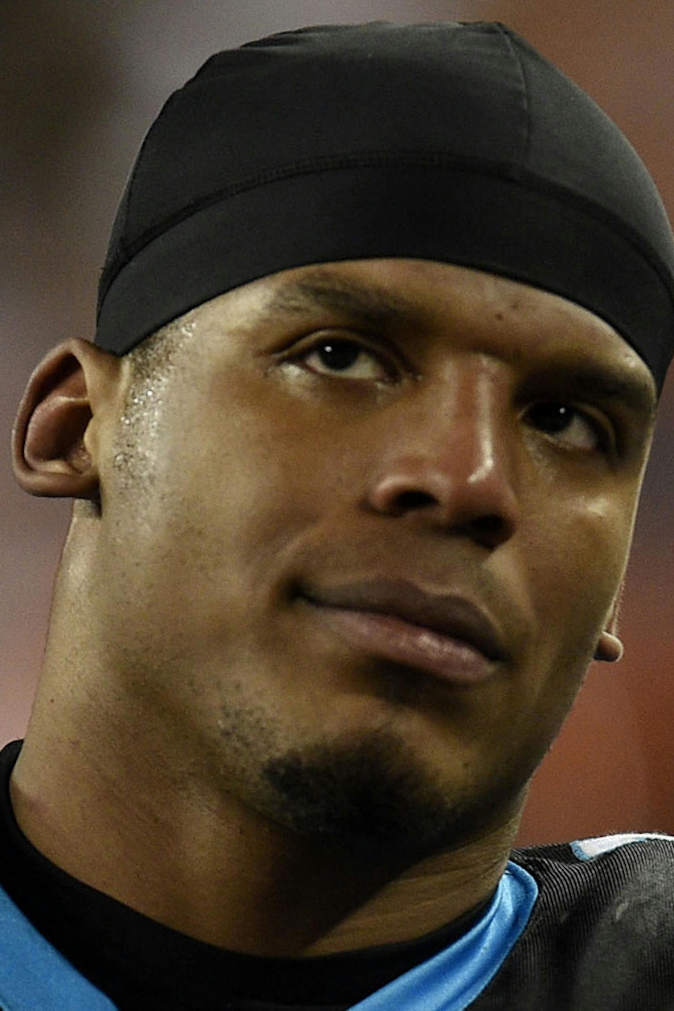 Carolina Panthers quarterback Cam Newton (1) sits on the bench in the fourth quarter of a 24-10 loss against the Denver Broncos in Super Bowl 50 at Levi's Stadium in Santa Clara, Calif., on Sunday, Feb. 7, 2016. (Jose Carlos Fajardo/Bay Area News Group/TNS)