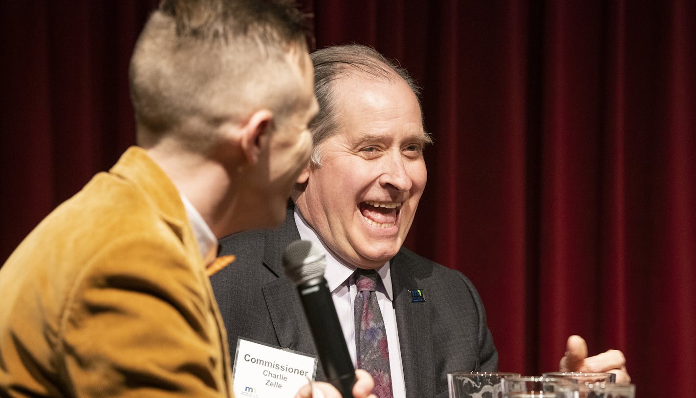 Charlie Zelle laughs as host Tane Danger asks him questions during an event to educate the public about the 35W@94 project. ] LEILA NAVIDI &#x2022; leila.navidi@startribune.com BACKGROUND INFORMATION: Outgoing MnDOT Commissioner Charlie Zelle participates in an event to educate the public about the 35W@94 project sponsored by the Theater of Public Policy at Finnegan's Brewery in downtown Minneapolis on Tuesday, December 4, 2018.