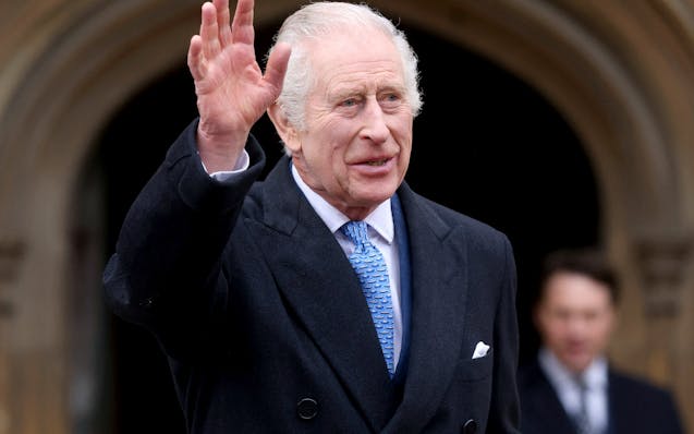 FILE - Britain's King Charles III waves as he leaves after attending the Easter Matins Service at St. George's Chapel, Windsor Castle, England, March 