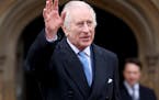 FILE - Britain's King Charles III waves as he leaves after attending the Easter Matins Service at St. George's Chapel, Windsor Castle, England, March 
