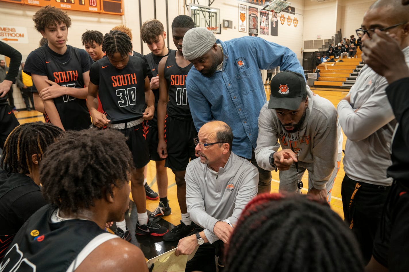 Coach Joe Hyser speaks to the Minneapolis South Boys Varsity Basketball team during a game against Bloomington Jefferson Friday, Jan. 06, 2023 at Minneapolis South High School in Minneapolis, Minn.