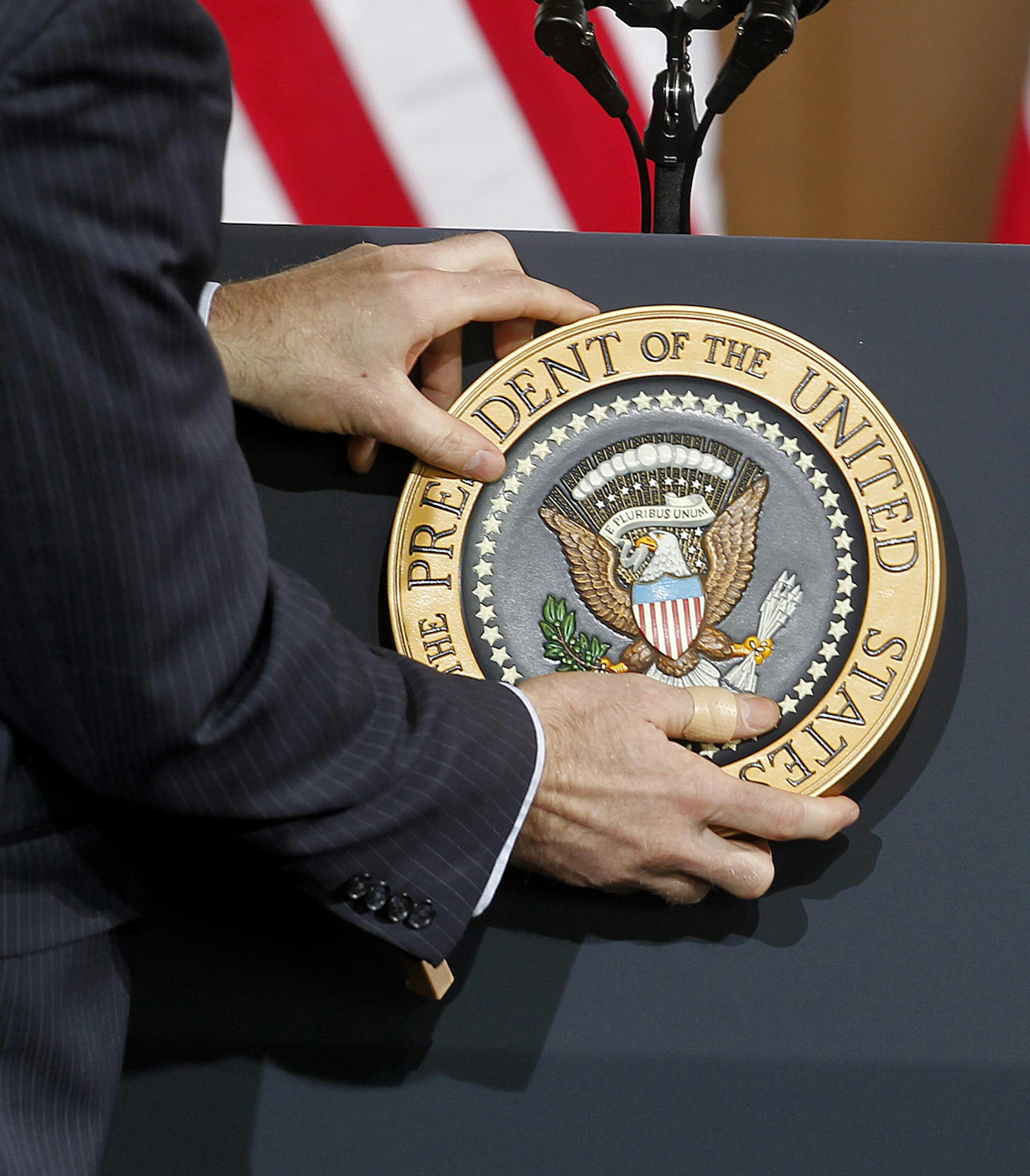 President Barack Obama presidential emblem was placed on the podium before he spoke to a crowd at the Union Depot, Wednesday, February 26, 2014 in St. Paul, MN. (ELIZABETH FLORES/STAR TRIBUNE) ELIZABETH FLORES • eflores@startribune.com
