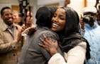 St. Louis Park Mayor-elect Nadia Mohamed is embraced by a supporter after winning her election Tuesday, Nov. 7, 2023, at the Westwood Hills Nature Cen