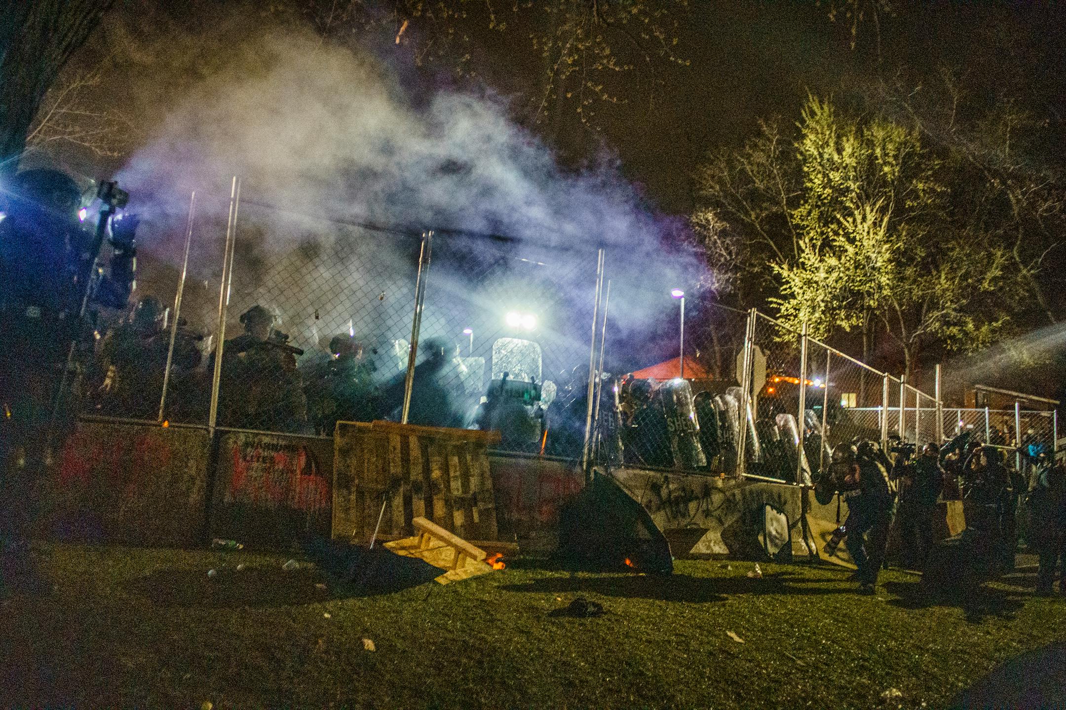 People protest near the Brooklyn Center Police Department in response to the fatal police shooting of Daunte Wright, Wednesday, April 14, 2021 in Brooklyn Center, Minn.