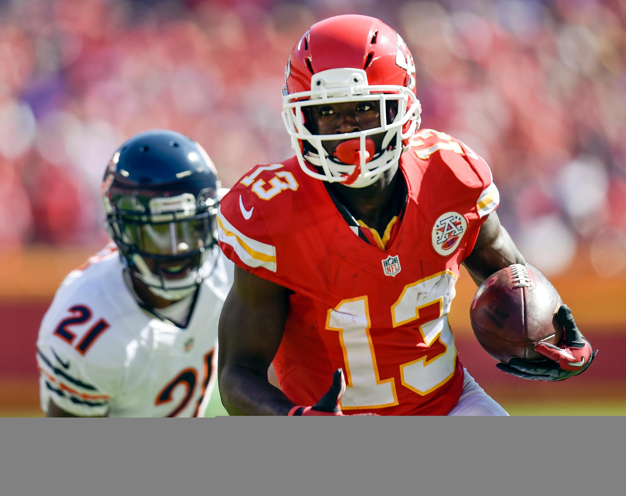 Kansas City Chiefs wide receiver De'Anthony Thomas (13) beats Chicago Bears strong safety Ryan Mundy (21) to the endzone for a touchdown during the second quarter on Sunday, Oct. 11, 2015, at Arrowhead Stadium in Kansas City, Mo.
