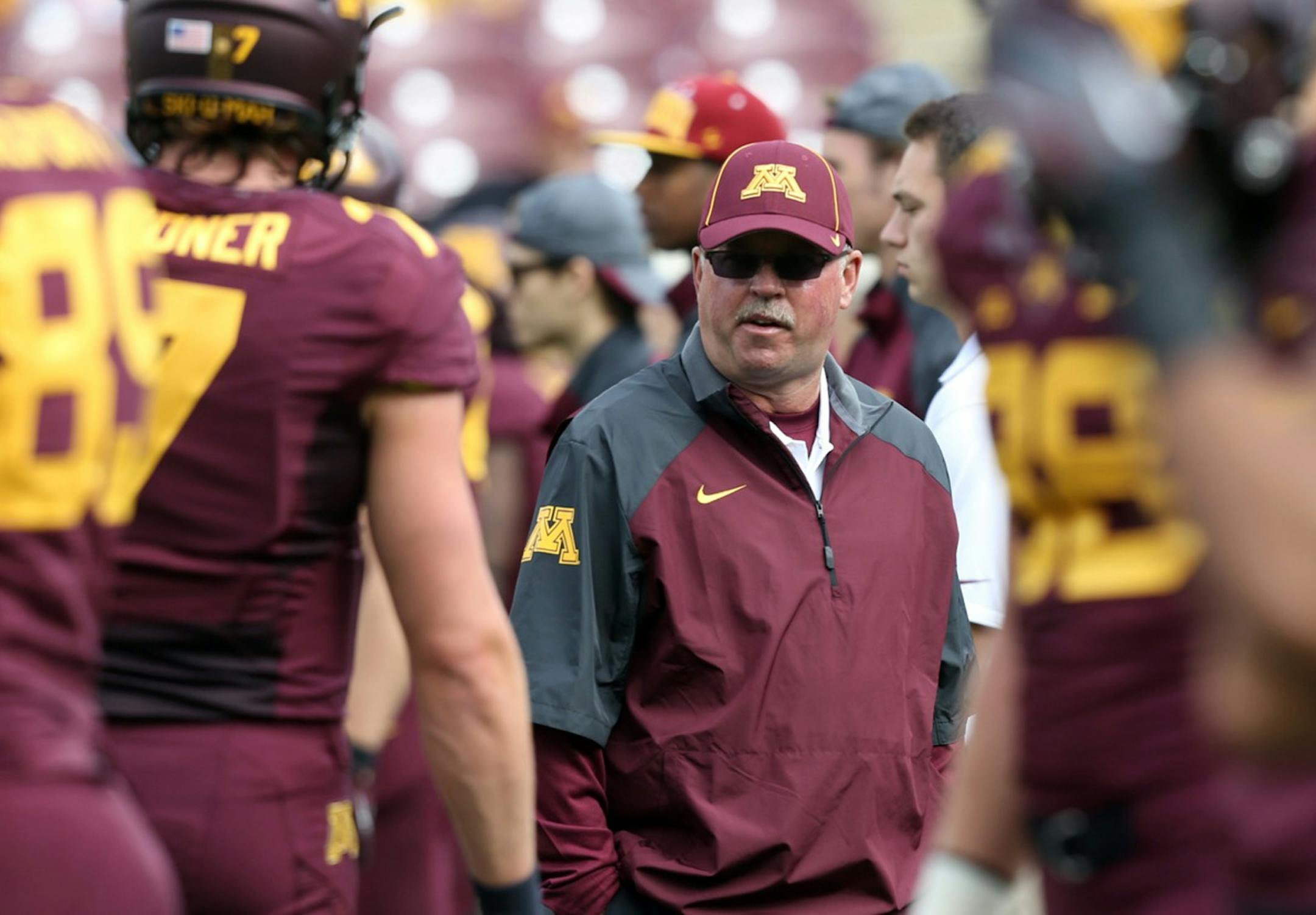 Gopher football coach Jerry Kill with the team durinmg pre-game warmpus. Last week he left the game at the half because of a siezure. ] Jim Gehrz, Star Tribune, Sept 21, 2013 , Minneapolis , MN