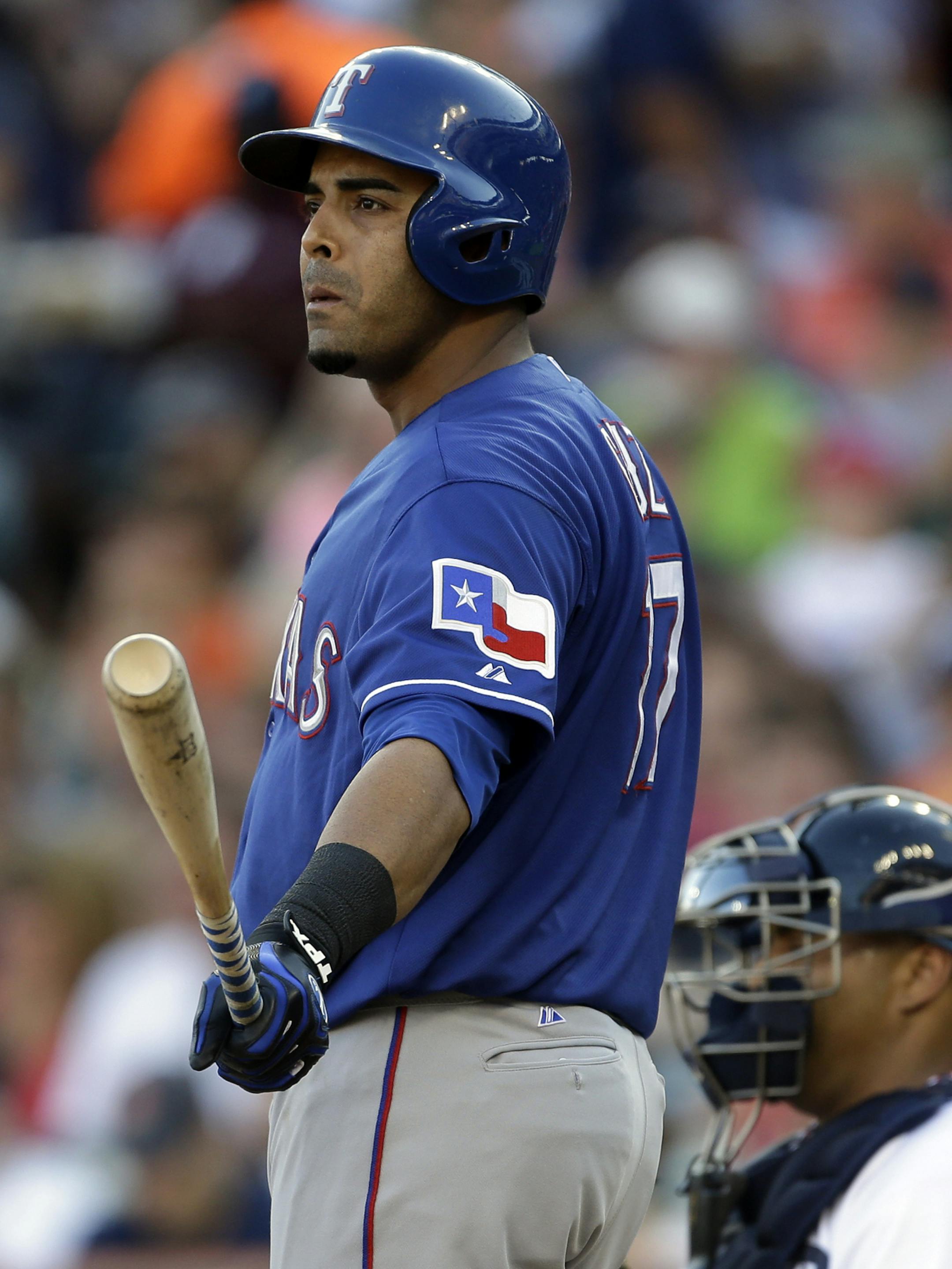 Texas Rangers' Nelson Cruz prepares to bat during the first inning of a baseball game against the Detroit Tigers in Detroit, Saturday, July 13, 2013. (AP Photo/Carlos Osorio) ORG XMIT: MIN2013080518064758