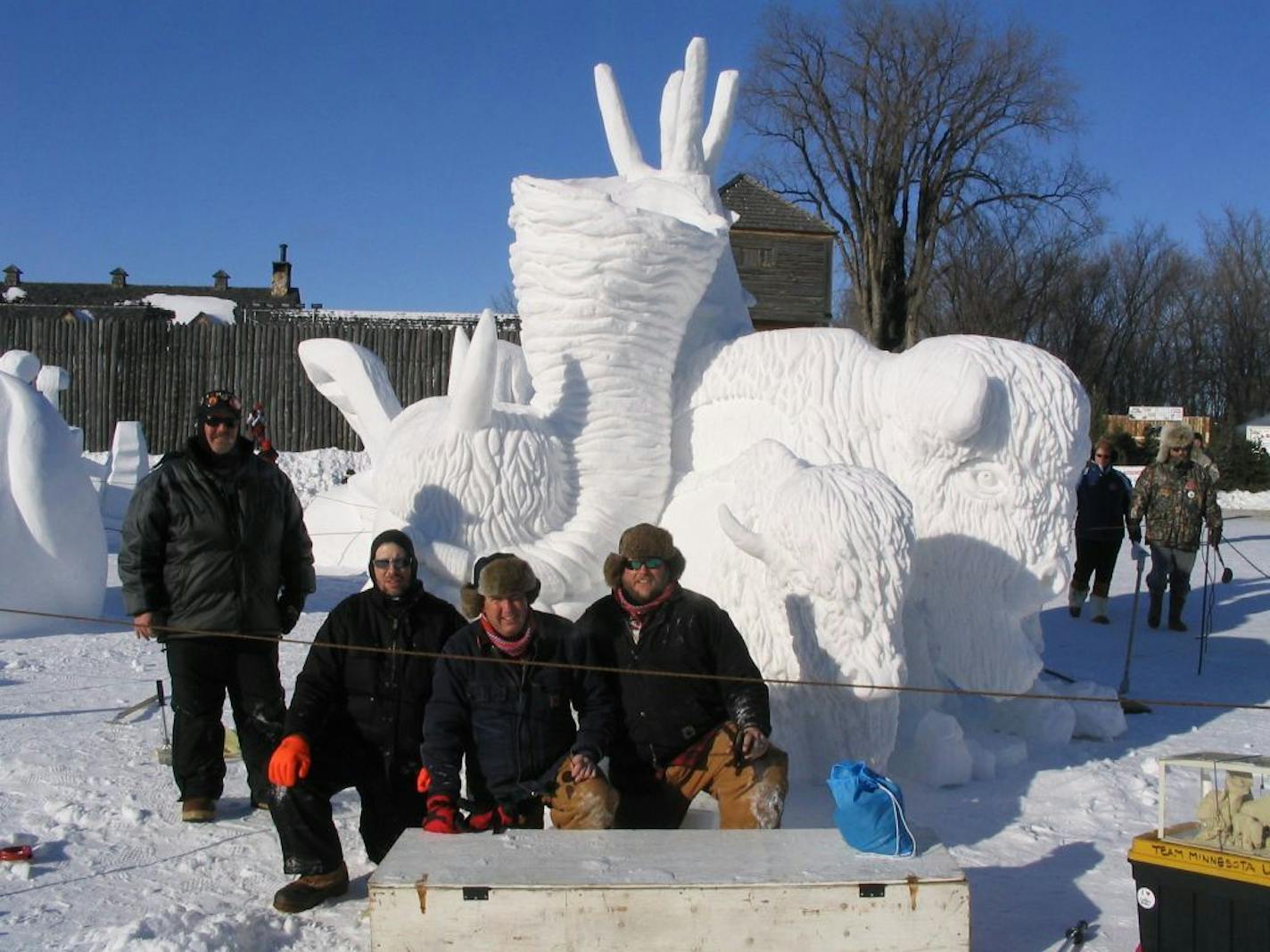 The Minnesota Big Snow team — including, from left, Pat Mogren, Kelley Casey, Gerry Proulx and Paul Diekoff — carved a buffalo at the 2008 Winnipeg Symposium.