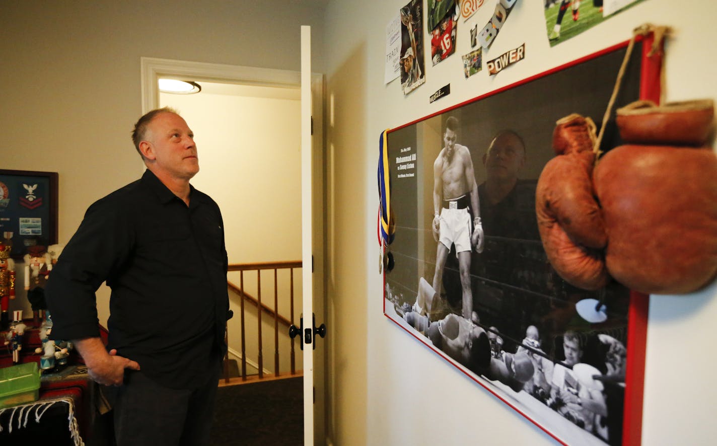 Don Amorosi has kept his son's bedroom as it was, with Archer's poster of Muhammad Ali, boxing gloves and photos of other athletes.