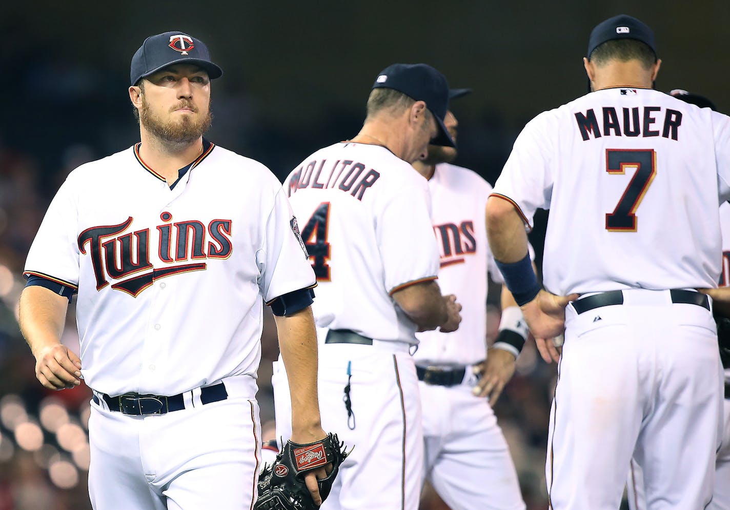 Phil Hughes, left, was pulled in the eighth inning Monday night at Target Field, but he allowed only three runs and, in what has been a 2015 standard for the Twins&#x2019; improved starters, kept the game close and gave their team a chance to win.