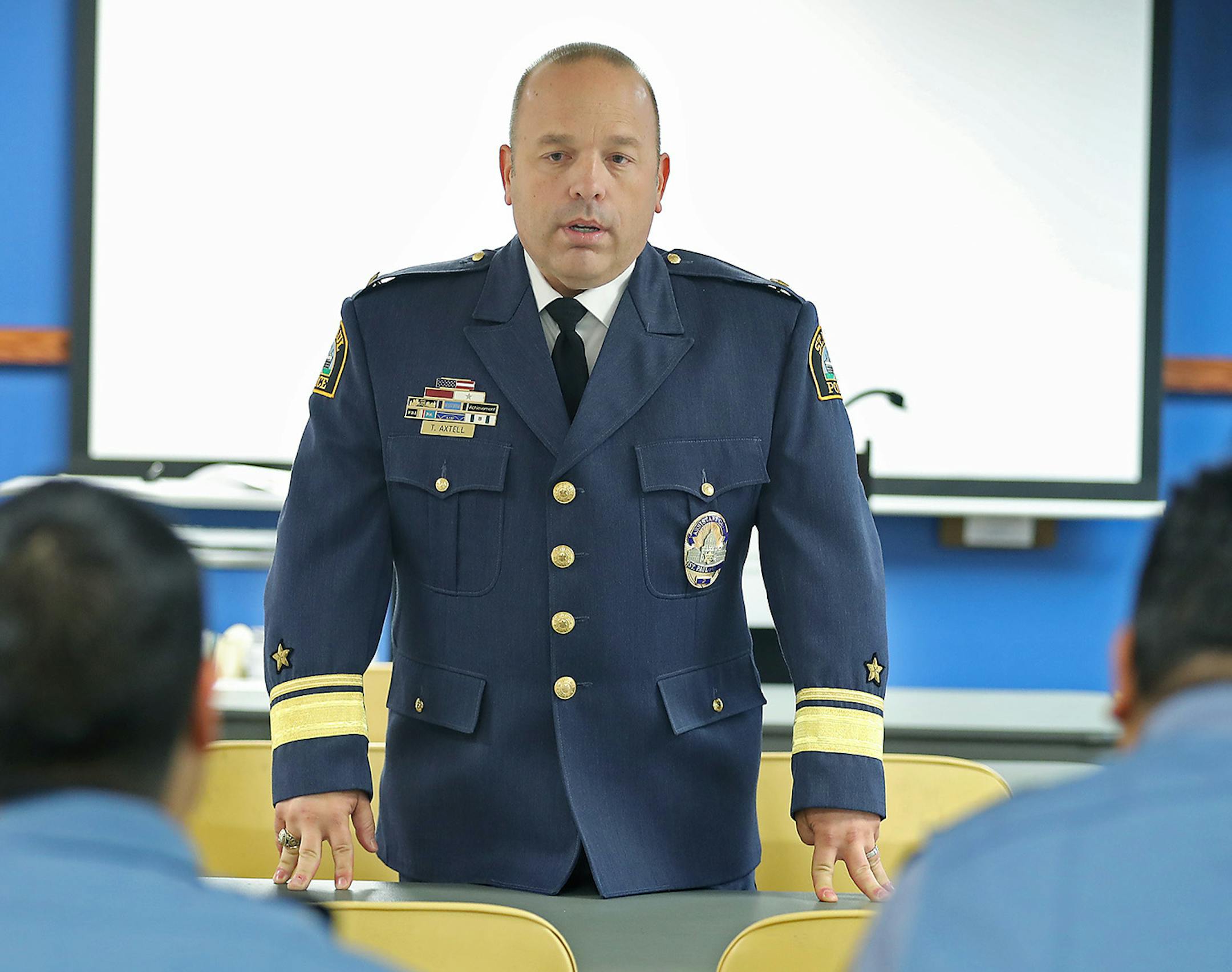 New St. Paul Police Chief Todd Axtell greeted addressed police officers regarding his new role and promotions during roll call at the Western District on his first day on the job, Thursday, June 23, 2016 in St. Paul, MN. Axtell has strong support in the department and community. However, he's taking the reigns at a complex time in police-community relations, and is the city's first white chief in about two decades. He has vowed to increase diversity, fight gun violence and champion community out