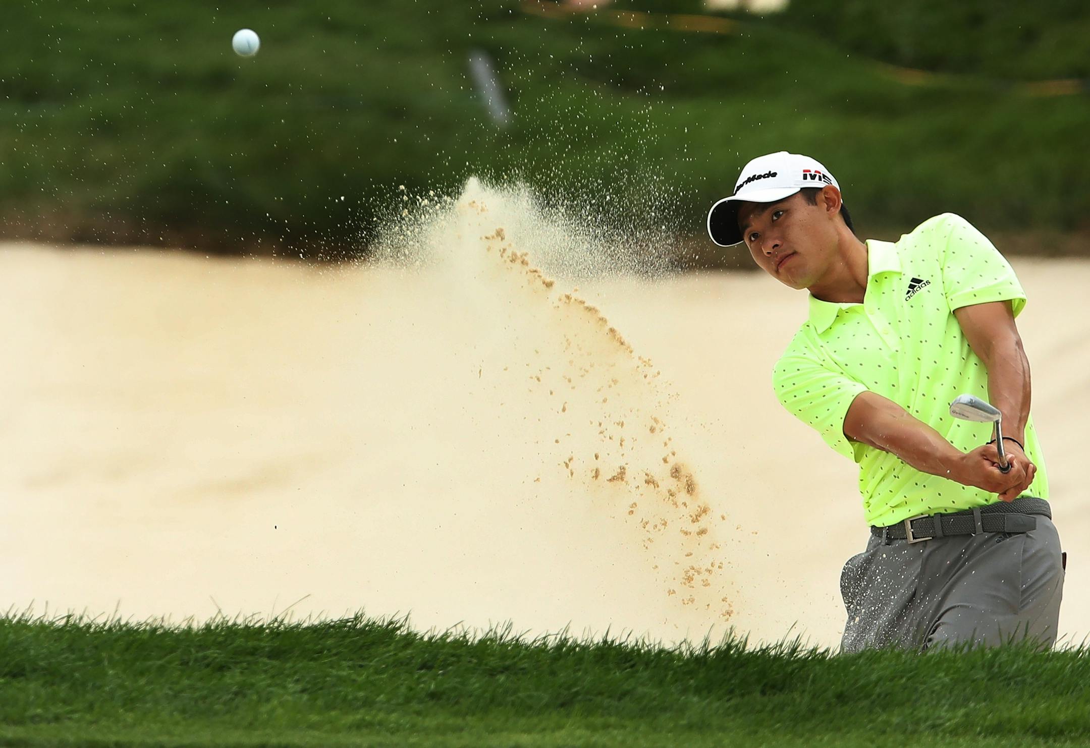 Collin Morikawa hit out of the bunker at 18 during third round action at TPC Twin Cities Saturday July,6 2019 in Blaine, MN.