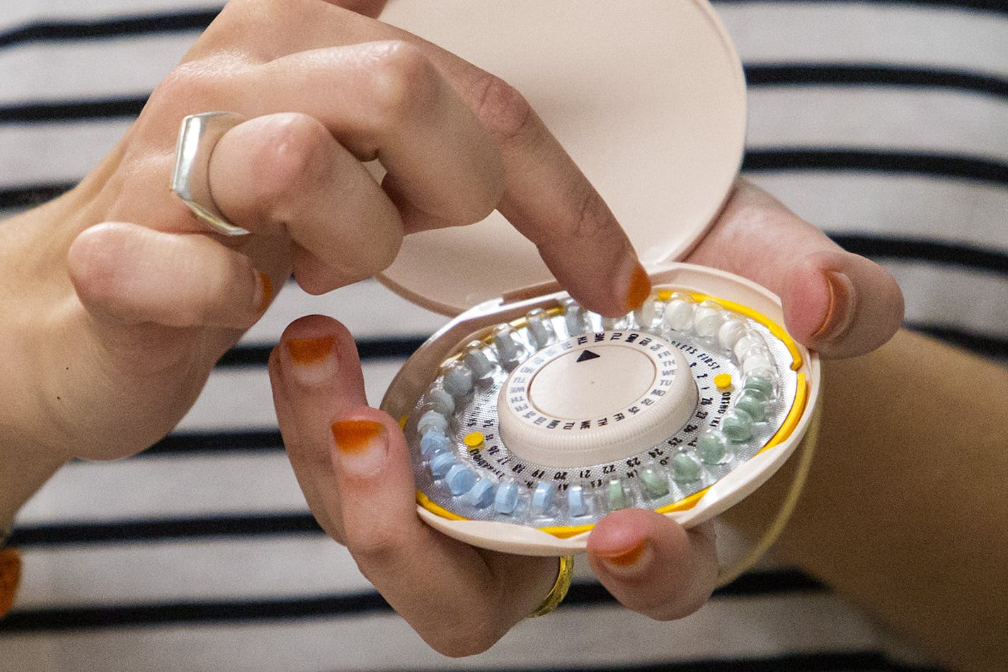 A family life and sexuality education teacher explains birth control pills at the Urban Assembly Institute in New York in April.