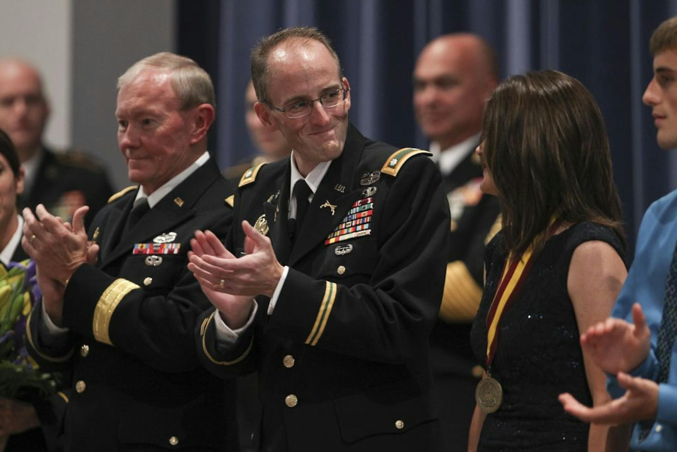 Lt. Col. Mark Weber received a medal in August for his service in Iraq. He stepped down for health reasons.