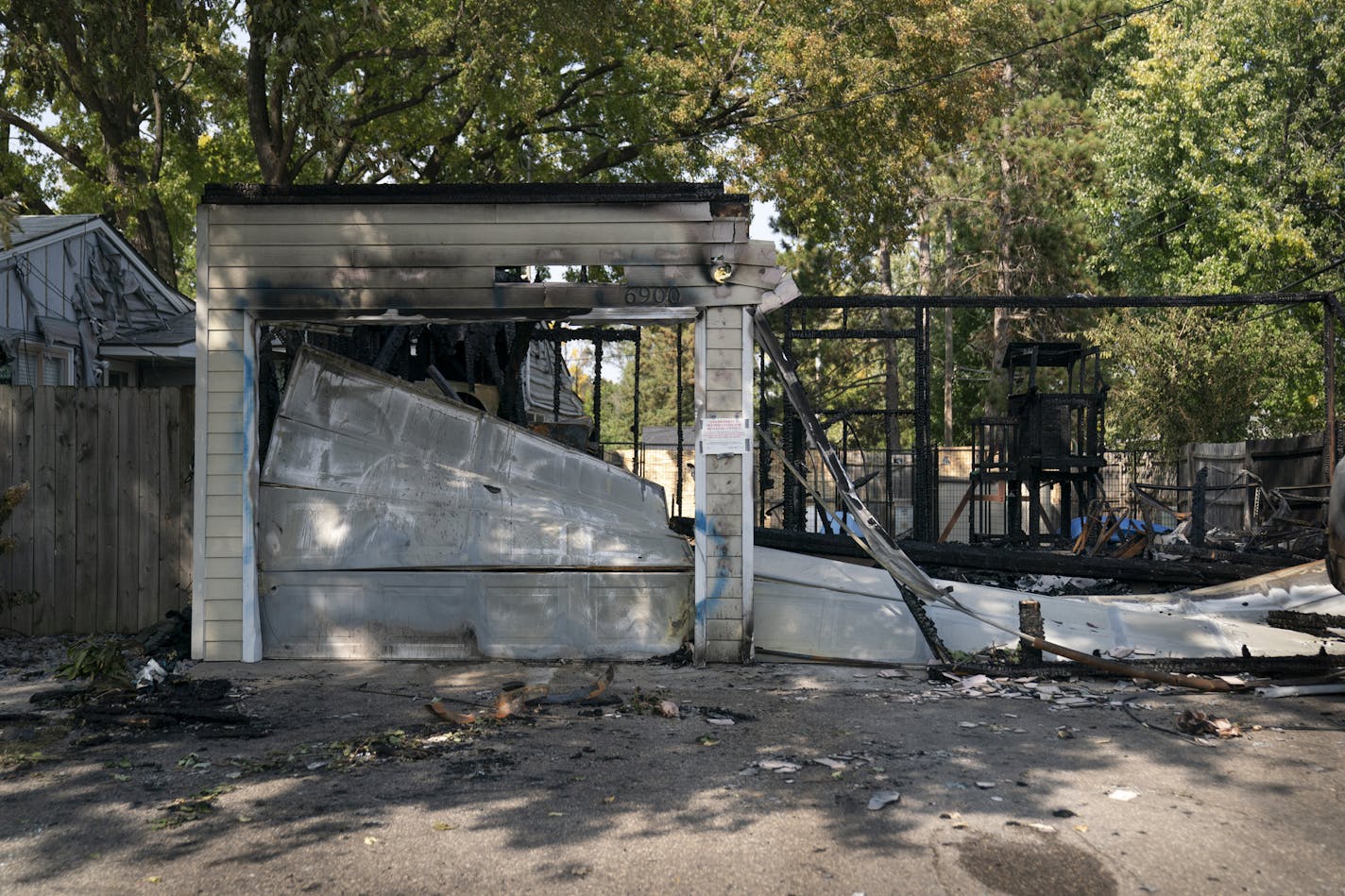 Deana and Dennis Molla's garage and cars were set ablaze in their at home in Brooklyn Center, Minn., on Wednesday, September 23, 2020. The fire has been declared an arson. Dennis' truck had a trump flag in the back that was stolen recently but he had replaced it with a new one before the fire. ] RENEE JONES SCHNEIDER renee.jones@startribune.com