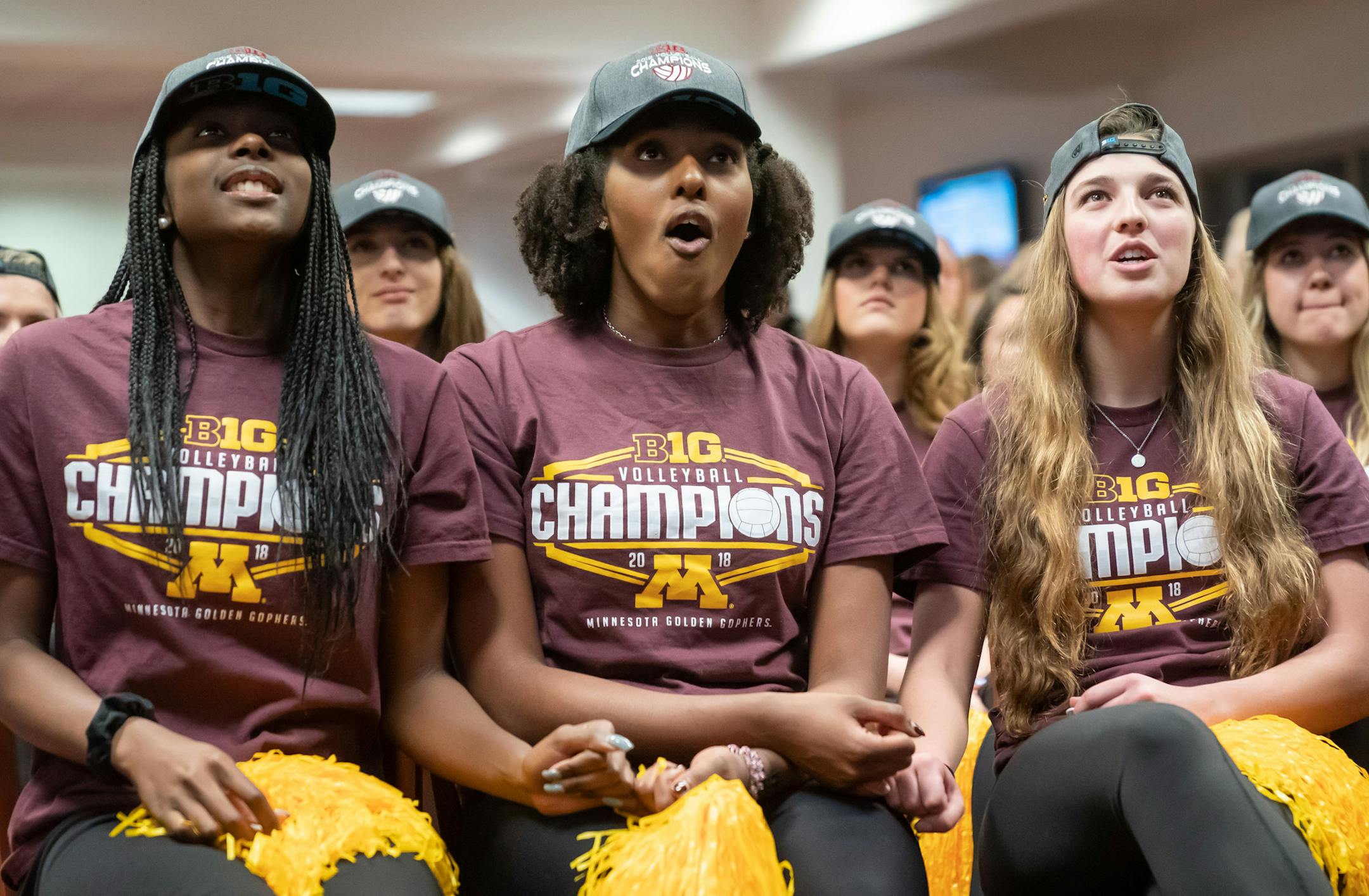 Adanna Rollins, Stephanie Samedy and Lauren Barnes linked pinkies as they watched the selection show on ESPN. ] GLEN STUBBE ï glen.stubbe@startribune.com Sunday, November 25, 2018 The Gophers volleyball team watched the Selection Show on television together.