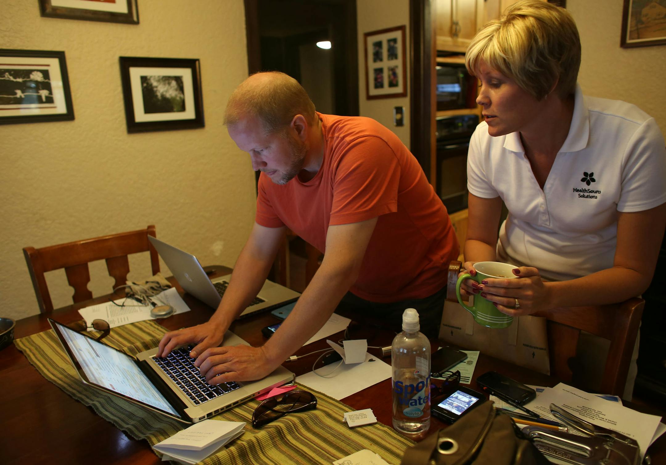 Chris Heagle and Julie Broberg, uncle and aunt of Isabel Ward, worked email and social media to get the word on their missing niece in Minneapolis Min., Tuesday, October 1, 2013. Ward is one of five missing girls from Seward Montessori School. ] (KYNDELL HARKNESS/STAR TRIBUNE) kyndell.harkness@startribune.com ORG XMIT: MIN1310011938186222