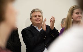 Marcus Bachmann applauded as wife Michele told the crowd she beilived that marriage should be between a man and a woman only. Presidential hopeful Rep