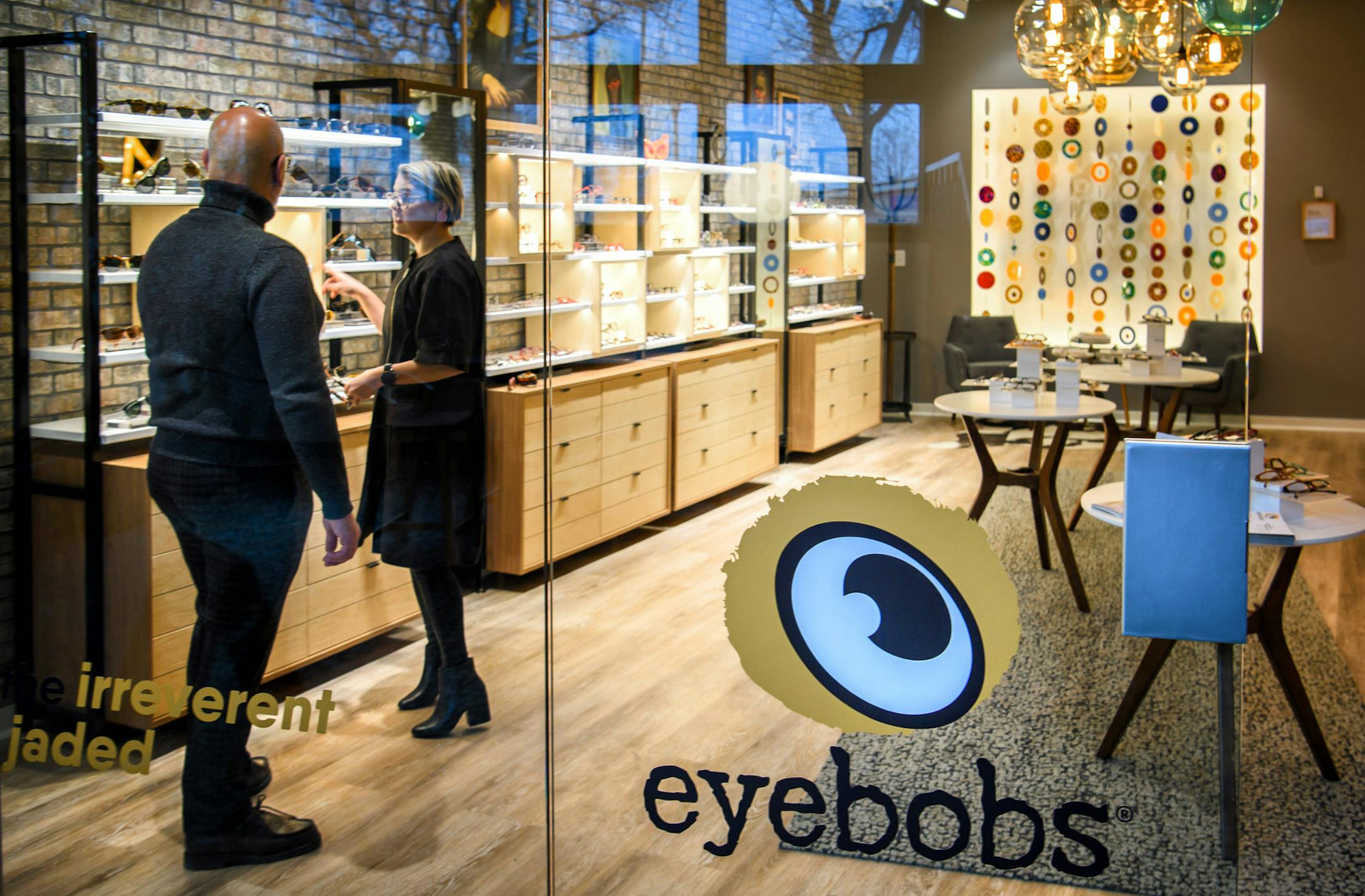 Eyebobs product design director Jason Engelman and optician Emily Kanz in the prototype store in Minneapolis. ] GLEN STUBBE • glen.stubbe@startribune.com Wednesday, January 10, 2018 Eyebobs, the company founded in 2001 to create irreverent, high quality eyeglass readers, has a new CEO and expansion plans. The company's first retail store will open in MOA in May and later in 2018 in Orlando. It's also expanding beyond the 40+ market to prescription eyewear and sunglasses for a younger audi
