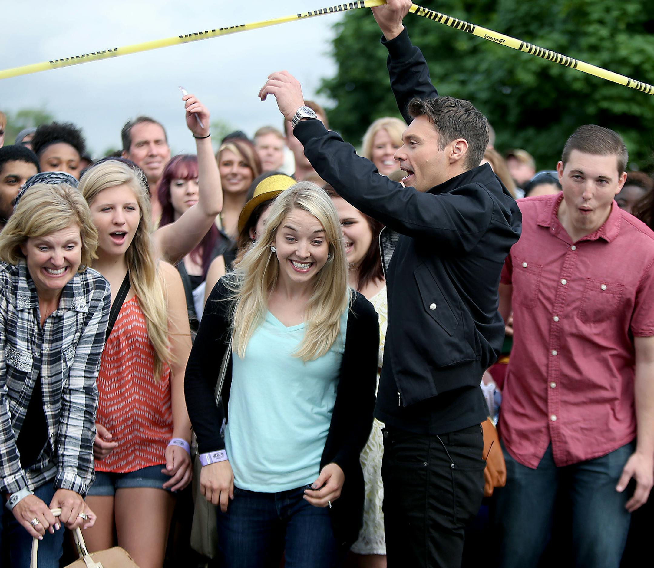 Ryan Seacrest, host of "American Idol," filmed the show with potential contestants outside Mariucci Arena, Wednesday, June 18, 2014 in Minneapolis, MN. The last time the show was in Minneapolis was in 2006. ] (ELIZABETH FLORES/STAR TRIBUNE) ELIZABETH FLORES • eflores@startribune.com
