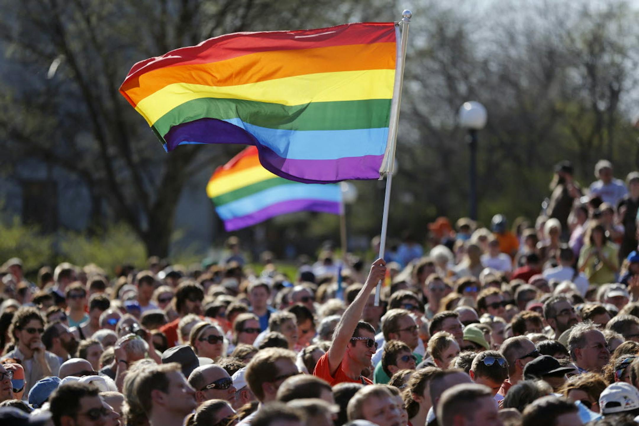 Gov. Mark Dayton signed the gay marriage bill into law in front of several thousand supporters.