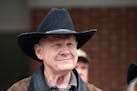 U.S. Senate candidate Roy Moore spoke to the media after he rode in on a horse to vote, Tuesday, Dec. 12, 2017, in Gallant, Ala.