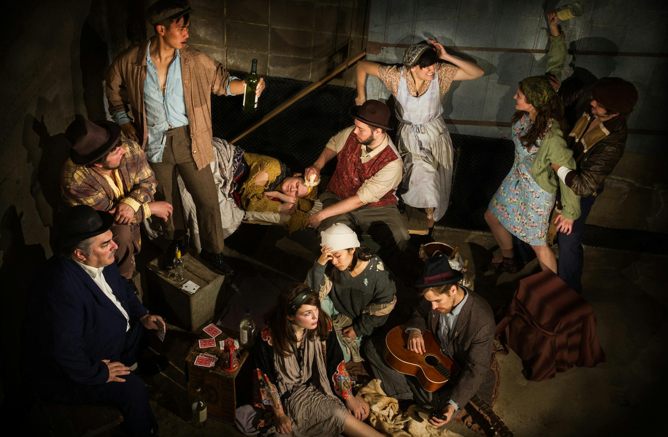 Nimbus Theatre presents Gorky's "The Lower Depths": Pictured (clockwise from top left): Gregory Yang, Taylor Van Denburgh, Brian O'Neal, Emily A. Grodzik, Tara Lucchino, Andrew Sass, Nicholas Nelson, Audrey Park, Karissa Lade, Adam King, Brian Hesser. Photographer: Mathieu Lindquist