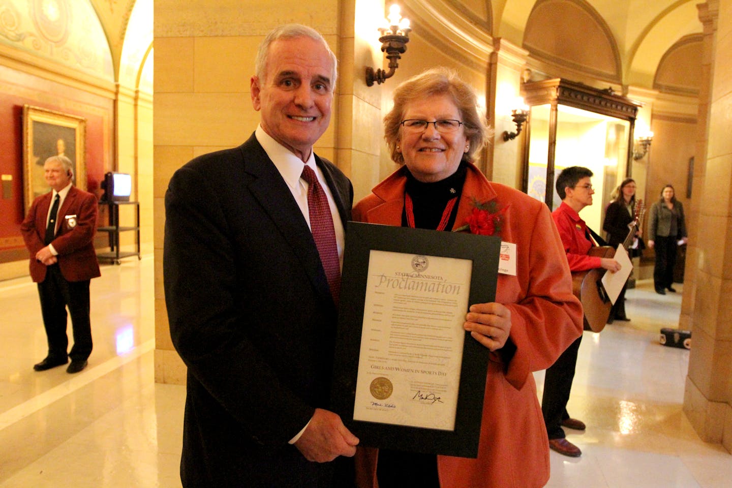 Governor Mark Dayton poses for a portrait with Stephanie Schleuder (cq/source), co-chair of the National Girls and Women in Sports Day event at the Minnesota State Capitol. Dayton presented a proclamation recognizing February 1 as Minnesota's Girls and Women in Sports day. ] MARISA WOJCIK marisa.wojcik@startribune.com Wednesday, February 1, 2012 was the 26th annual National Girls and Women in Sports Day at the Minnesota State Capitol rotunda. This year also marks the 40th anniversary of the Title IX amendment which guarentees equal opportunity to participation in any education program or activity, regardless of sex or gender. The event honored Minnesota leadership on issues involving women and girls in sports.