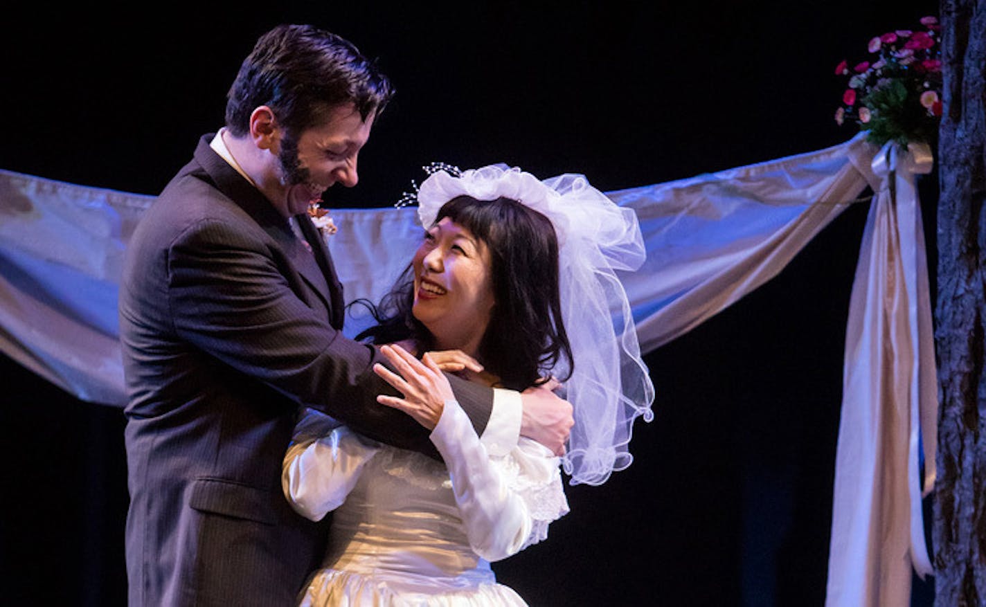 Max Wojtanowicz (Le Beau/Silvius) and Sun Mee Chomet (Phoebe) in the Guthrie Theater's production of As You Like It by William Shakespeare and directed by Lavina Jadhwani. credit: Dan Norman