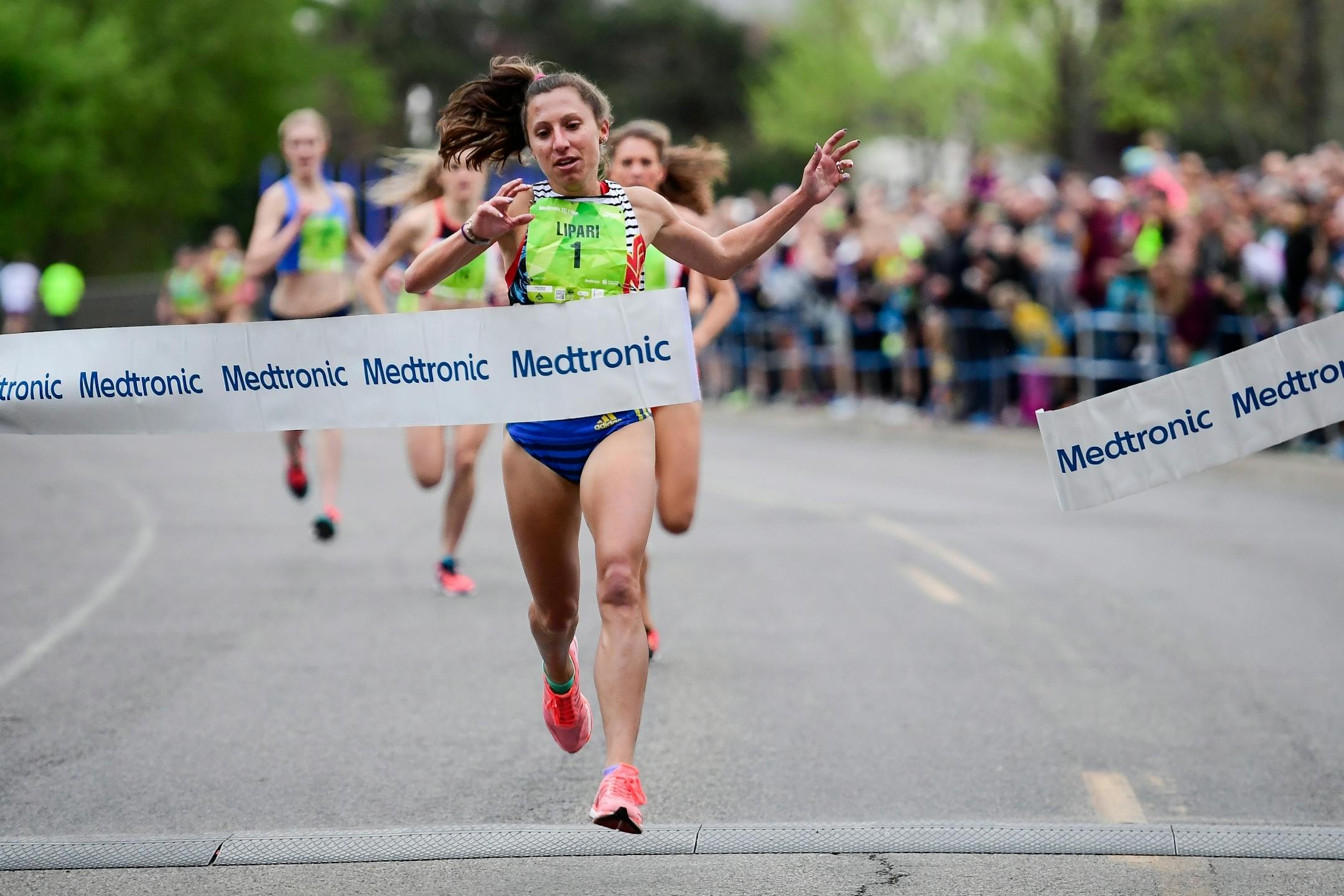 Emily Lipari, 25, of San Diego, crossed the finish line to win her second Medtronic TC 1 Mile Professional Invite Championship race Thursday night in Minneapolis.