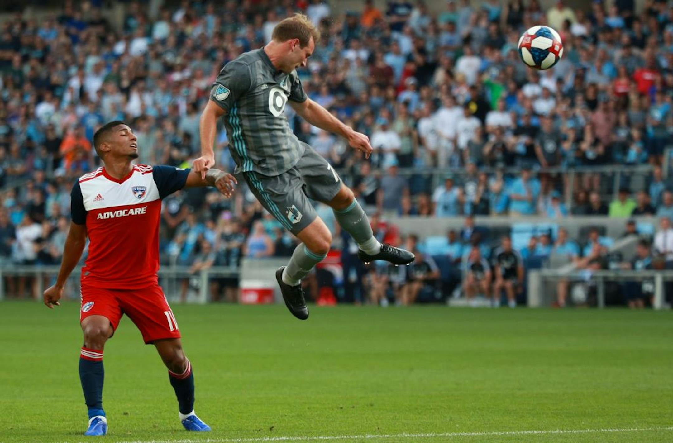 Chase Gasper (77) heads a ball in the box in the first half. ALEX KORMANN ¥ alex.kormann@startribune.com The Minnesota United FC took on FC Dalls on Saturday July 13, 2019 at Allianz Field in St. Paul, MN.