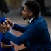 Donzell Dixson adjusted the bow on his daughter, Lexington, 2, as they tentatively made their way onto the dance floor during the 9th Annual Father Da