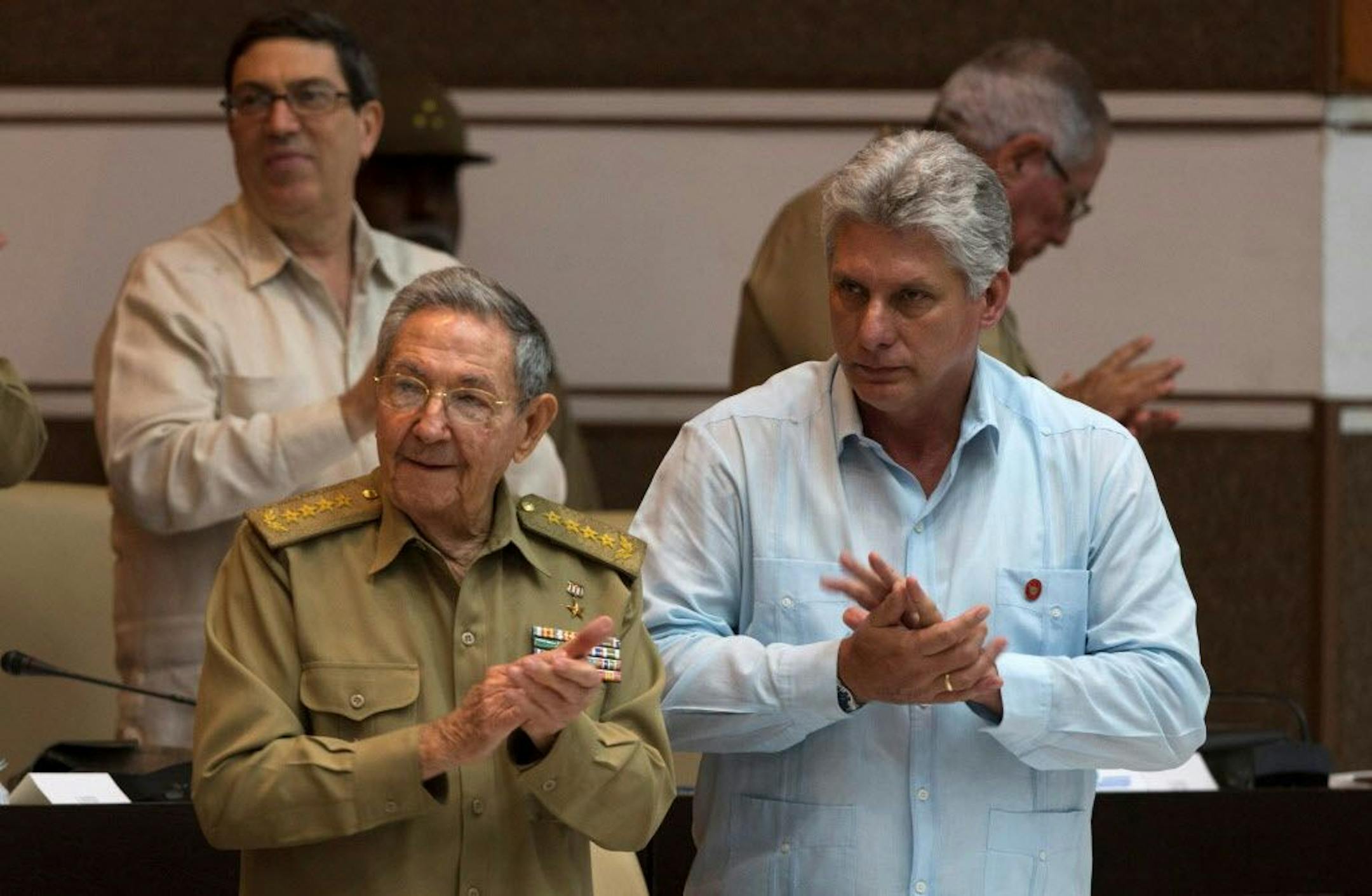 Cuba's President Raul Castro, left, and Cuba's Vice President Miguel Diaz Canel applaud during the National Assembly in Havana, Cuba, Friday, July 8, 2016. Cuba's parliament has convened for one of its twice-annual plenary sessions amid warnings from government officials that the country faces energy restrictions during tough fiscal times.