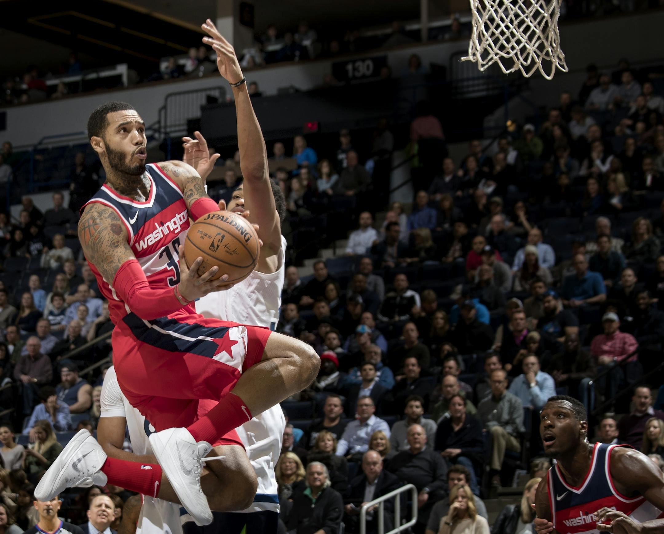 Mike Scott (30) attempted a shot in the fourth quarter.