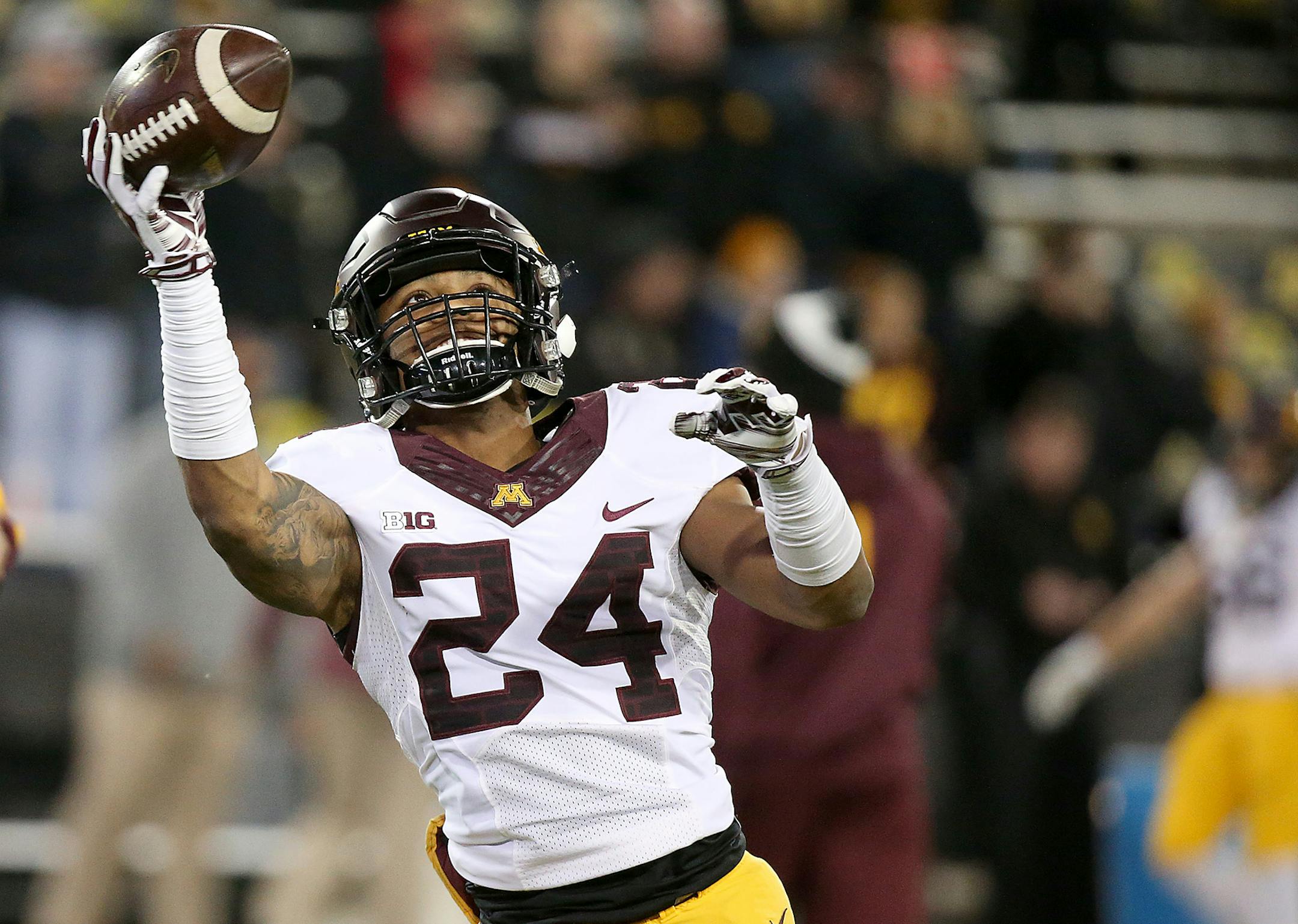 Minnesota's running back Rodney Smith warmed up before the Gophers took on the Iowa Hawkeyes at Kinnick Stadium. Smith did not play due to injury.