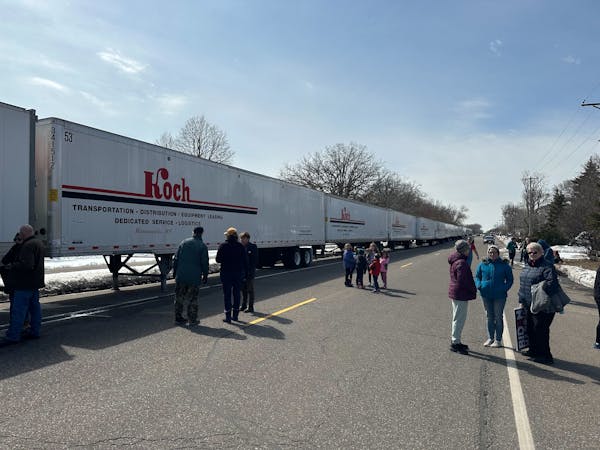 Bryan Lorenzen said he lined up semis outside the plant to help secure it for the president’s visit. Lorenzen works for Koch, which is contracted by