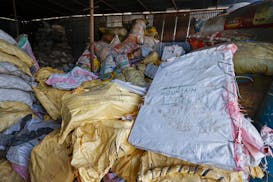 Sacks of garbage collected en route Mount Everest are piled before recycling at a facility operated by Agni Ventures, an agency that manages recyclabl