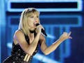 FILE - In this Oct. 22, 2016 photo, Taylor Swift performs in Austin, Texas. Ninety-six-year-old Cyrus Porter is a devoted Taylor Swift fan and has tra