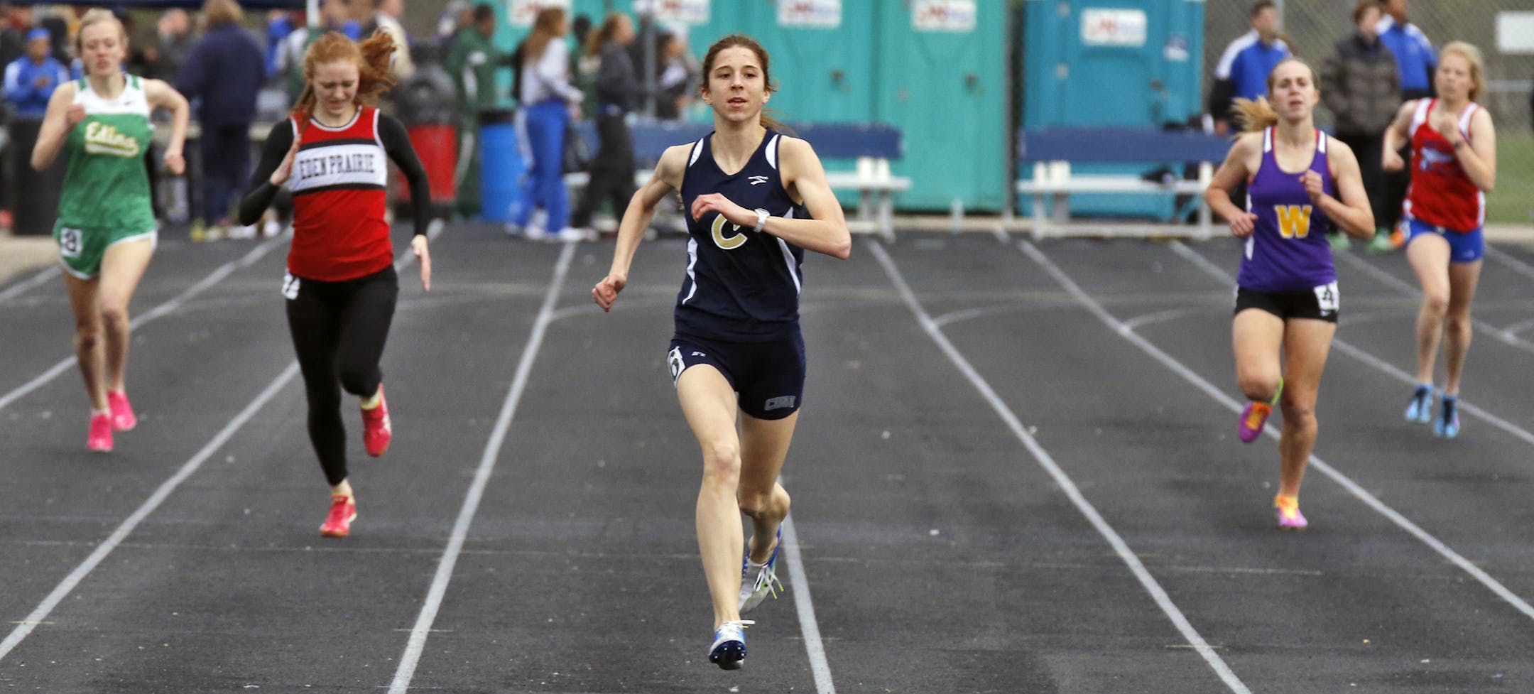 Chanhassen's Emily Castanias, center, running a 400 meter dash during a recent meet at Wayzata high school. ] . (MARLIN LEVISON/STARTRIBUNE(mlevison@startribune.com)