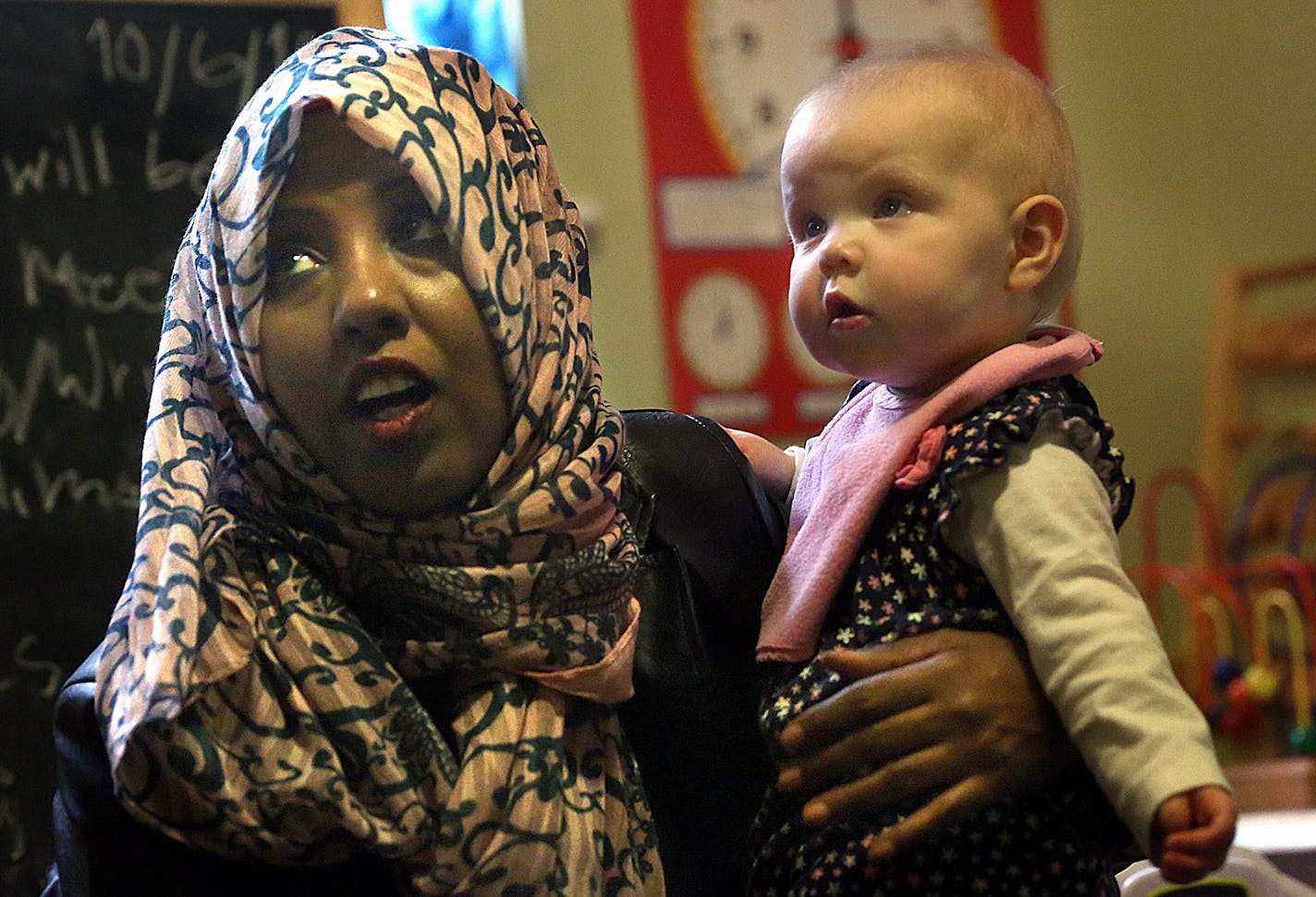 Farhia Egal held a child named Eva, 11 months, at Egal&#xed;s child care center in Richfield. ] JIM GEHRZ &#xef; james.gehrz@startribune.com / Richfield, MN / October 6, 2015 / 10:30 AM &#xf1; BACKGROUND INFORMATION: Dozens of Somali daycares have sprung up across the metro as more Somali women work outside the home. On the heels of high-profile fraud charges faced by some of these providers, community leaders and others are looking to push the businesses to improve the quality of their services