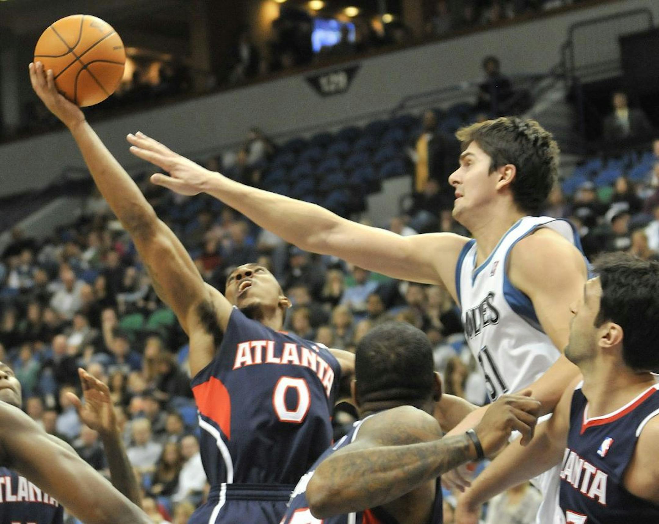 NBA hoops were on last Nov. 5 in the season oepner at Target Center, where the Wolves' Darko Milicic tried to block a shot by Atlanta's Jeff Teague.